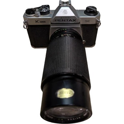 Pentax K1000 35mm SLR Film Camera + Seikor 80-205mm Zoom Lens – Tested - Image 1 of 4