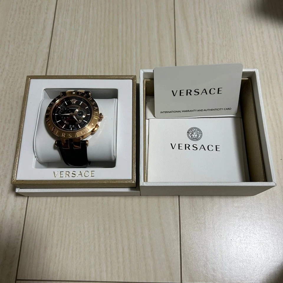 Reloj Versace V-Race Dual Time Hombre Unisex Esfera Marrón Dorado Negro Cuero De Japón Foto 1 de 4