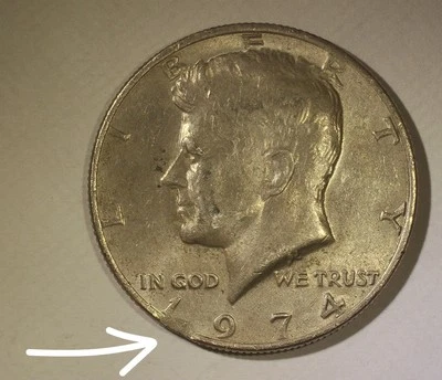 Medio dólar Kennedy 1974 con clip de borde pequeño - planchet recortado - moneda de error Foto 1 de 4