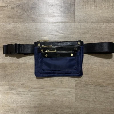 Riñonera Tutilo New York azul/negro correa ajustable bolso cintura herrajes dorados Foto 1 de 4