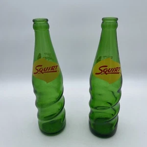 2 VINTAGE SQUIRT Soda Pop Spiral Green Bottles 12oz MADE IN THE USA - Picture 1 of 5