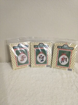 3 Cross Stitch Pattern Kits Santa Claus Sledding Teddy & Snowman by Traditions  - Image 1 of 4