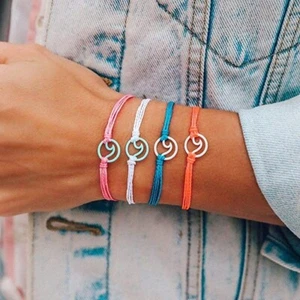Bracciale Pura Vida Aqua o Onda Smaltata Bianca - Impermeabile, Fascia Regolabile - Foto 1 di 5