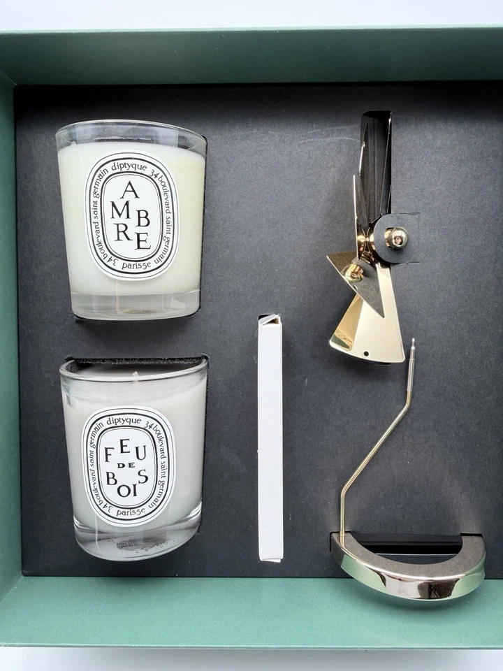 NUEVO JUEGO CARRUSEL DIPTYQUE VELAS AMBRE Y FEU DE BOIS 70g EDICIÓN FESTIVA Foto 1 de 4