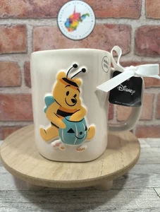Taza Rae Dunn Disney Winnie The Pooh In Bee Disfraz Halloween Marfil/Rosa Nueva con Etiquetas  - Imagen 1 de 6