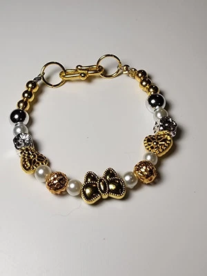 Infant Toddler First Beaded Bracelet With Gold And Silver Beads And Bow & Hearts - Image 1 of 3