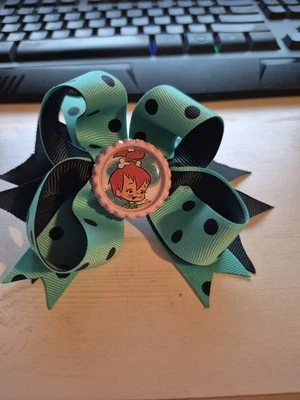 Guijarros verde azulado y negro 5" moño de pelo con clip de pasador  Foto 1 de 4