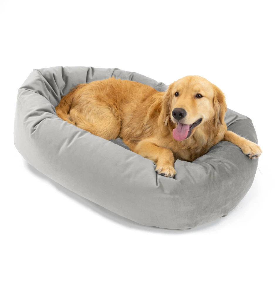 Cama calmante de terciopelo para mascotas Majestic lavable acogedora mullida donut cama para perros Foto 1 de 3