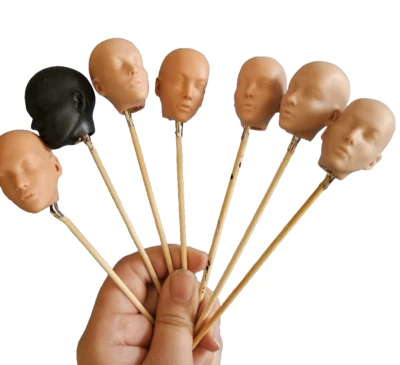 7 cabezas de goma para muñecas Foto 1 de 4