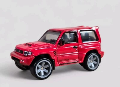 MITSUBISHI PAJERO EVOLUTION 4x4 Diorama Coleccionable DieCast Modelo Coche 1:64 SUELTO Foto 1 de 4