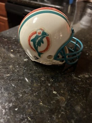MINICASCO DE FÚTBOL AMERICANO MICRO 2 7/8 LOGOTIPO RETRO DE COLECCIÓN DE LOS MIAMI DOLPHINS RIDDELL Foto 1 de 4