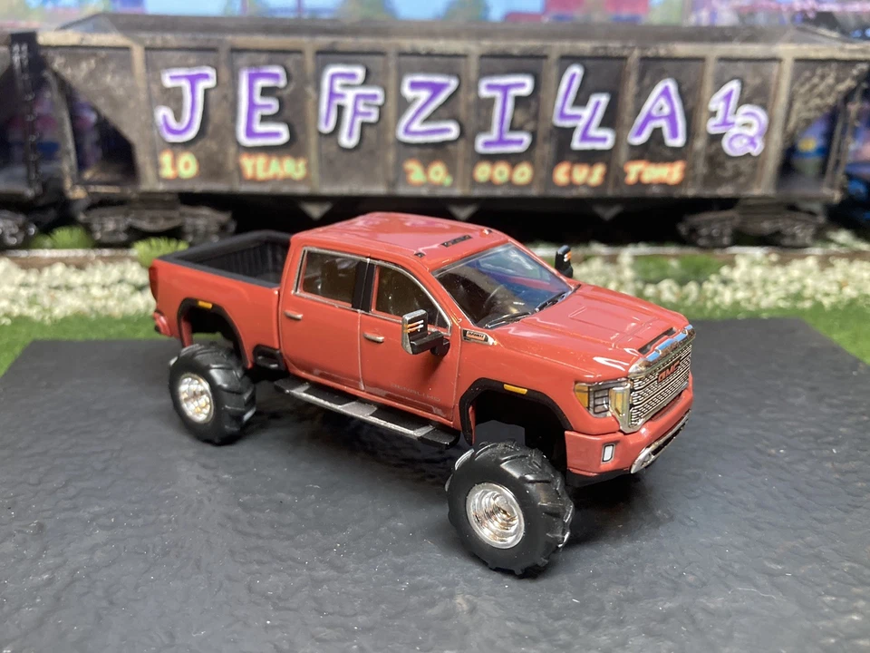 2022 GMC Sierra 2500 HD Lifted 4x4 Truck 1/64 Diecast Custom Duramax Greenlight - Image 1 of 4
