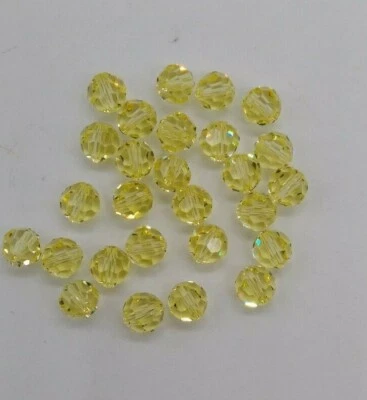 Cristal Swarovski Jonquil facetado redondo 5000 cuentas; 6 mm (12) u 8 mm (6) Foto 1 de 2