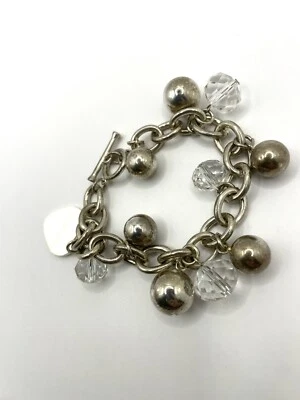 Brazalete Cha Cha Cha Cha Cha Cha Cha Cha Cha Cha Plateado y Cuentas de Cristal  Foto 1 de 4