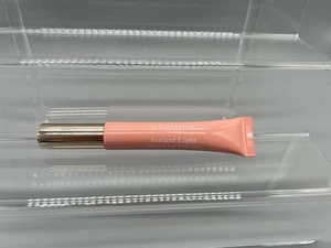 Perfeccionador de labios natural Clarins Eclat Minute Instant Light 04 Candy Shimmer 0,35 oz - Imagen 1 de 3