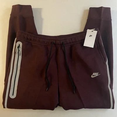 Pantalones deportivos reflectantes Nike Tech Fleece para hombre XL calce ceñido pierna cónica Foto 1 de 4