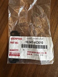 OEM Genuine Toyota Gasket Coolant Outlet 16341-AD010 - Bild 1 von 2