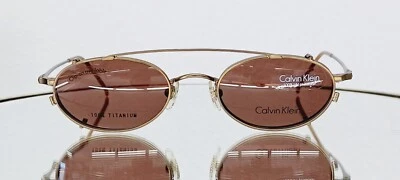 Óculos vintage CALVIN KLEIN CK516 053 com clipe solar 48-20 latão titânio - Imagem 1 de 4