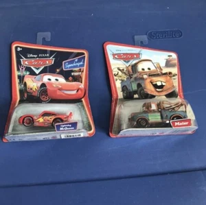 VTG 2005 Disney Pixar Cars Mater H6408 Supercharged Lightning McQueen L5251 MOC - Picture 1 of 9