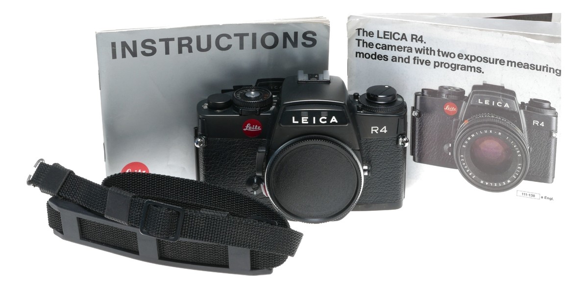 Leica R4 Black 35mm film camera body Leitz SLR strap and Leica R4 Black 35mm film camera body Leitz SLR strap and