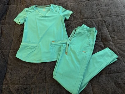 Conjunto Exfoliante Cherokee Form, Top Xs, Pantalones Xs Alto “verde azulado” Foto 1 de 3