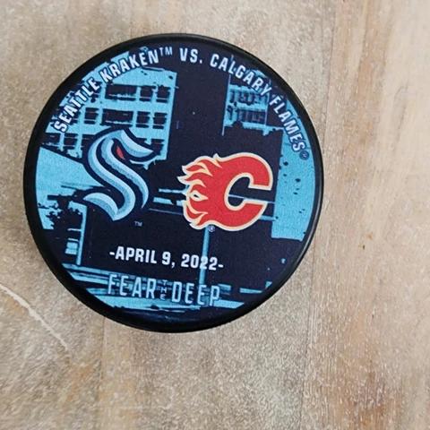 SEATTLE KRAKEN vs Calgary Flames Match Puck 4/9/22 Cover