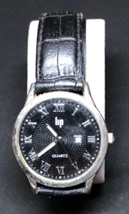 #2 Ancienne Montre Homme Lip Bracelet Cuir Noir En L’état - Imagen 1 de 12