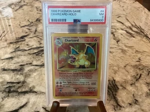 PSA 7 Charizard #4 Unlimited Holo Rare Base Set Pokemon Game 1999 Near Mint - Picture 1 of 2