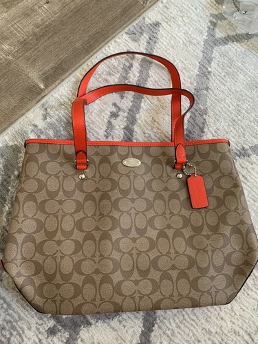 Nuovi cinturini in pelle arancione firma logo COACH F34603