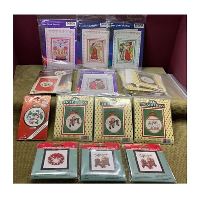 13 VINTAGE DIFFERENT PICTURES/SIZES OF CHRISTMAS/HOLIDAY CROSS STITCHING KITS - Image 1 of 4