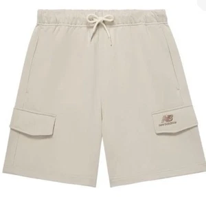 New Balance Jungen Fleece Cargo Short Haferflocken Farbe Kinder Größe Small 8 - Bild 1 von 7