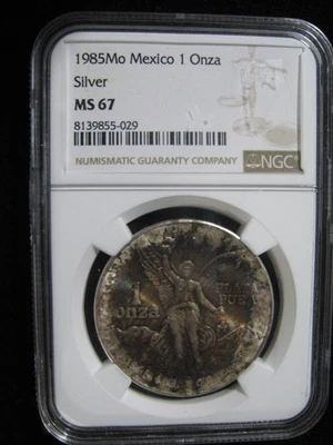 1985 MEXICO SILVER ONZA LIBERTAD NGC MS 67 ROLL END TONING - Image 1 of 3