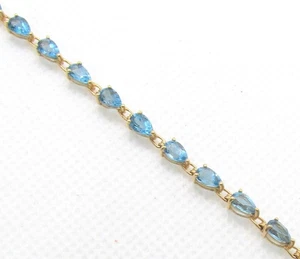 PULSERA TENIS TOPACIO AZUL CORTE PERA ORO AMARILLO 10K 7.5" ~ 4.2G - Imagen 1 de 4