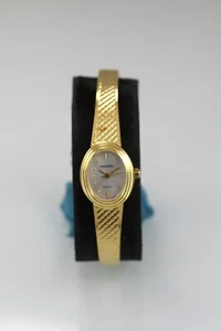 Montre femme Gruen acier inoxydable or pile étanche quartz blanc - Photo 1 sur 6