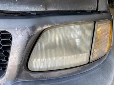 Driver Headlight Heritage Fits 97-04 FORD F150 PICKUP 1949110 - Image 1 of 4