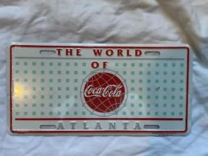 The World of Coca-Cola Booster License Plate Atlanta Georgia Coke 1995 sealed - Picture 1 of 2