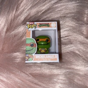 Funko Bitty Pop! Teenage Mutant Ninja Turtles TMNT Modellino Michelangelo #62 vinile - Foto 1 di 4