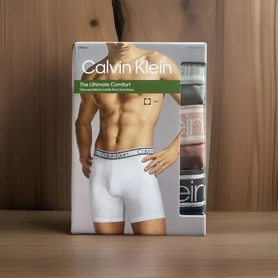 Paquete de 3 calzoncillos boxer Calvin Klein Ultimate Comfort talla mediana gris negro malva Foto 1 de 4