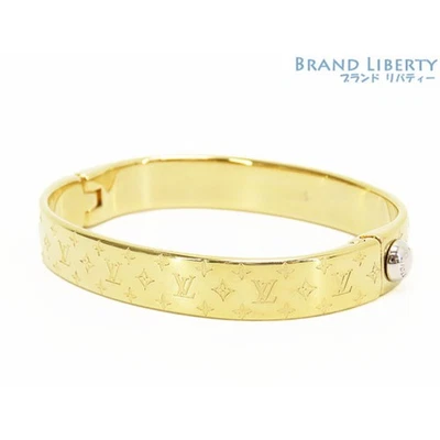 Pulseira Louis Vuitton punho nanograma metal dourado usada LIBR-0 - Imagem 1 de 4