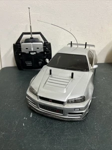 Tamiya NISMO R34 GT-R Z-Tune 1/10 4WD RC CAR - Picture 1 of 20