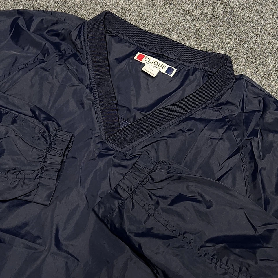 Cortavientos Clique Para Hombres Grande Cuello en V Azul Bolsillos Golf Impermeable Rendimiento Foto 1 de 4