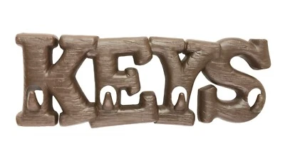 Colgador de llaves de montaje en pared de plástico marrón Burwood 1990 vintage 4 ganchos Foto 1 de 2