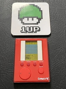 Connect 4 Electronic Handheld Game Milton Bradley 2007 Working On The Go - Bild 1 von 4