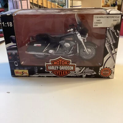 Bicicleta fundida a presión Harley Davidson 1997 MAISTO FLHR Road KING escala 1:18 negra Foto 1 de 4