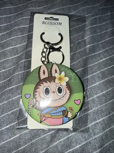 Copertina verde con specchio mostro marrone double face con portachiavi/borsa ciondolo - Foto 1 di 5