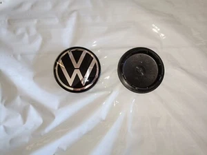 COPPIA COPRIMOZZO COPRI CERCHIO CENTRALE VW  5GM-601-171 ORIGINALI - Picture 1 of 4