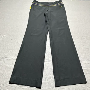 Pantalones Nike para mujer medianos gris púrpura acampanados atléticos tirón en vivo leggings fuertes - Imagen 1 de 16