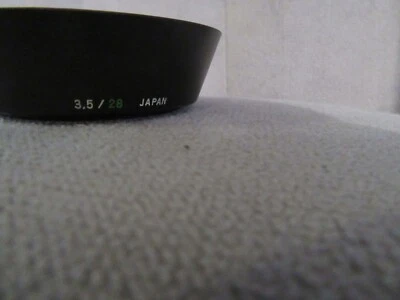 Bonito parasol oficial NOS Olympus para el objetivo 28 mm f3,5 Foto 1 de 3