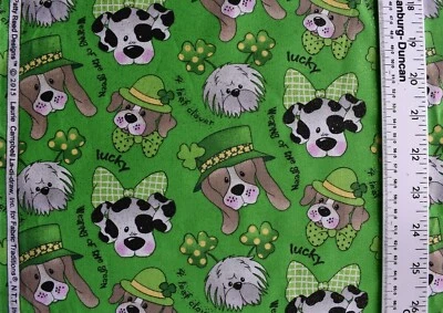 SHAMROCKS PUPS GOLD GLITTER ON GREEN  100% COTTON FABRIC  24X43 INCHES - Image 1 of 2