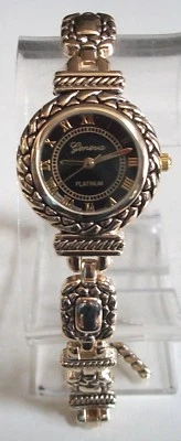 Mujer Acabado Dorado Esfera Negra Moda Elegante Informal Reloj Toggle Foto 1 de 4